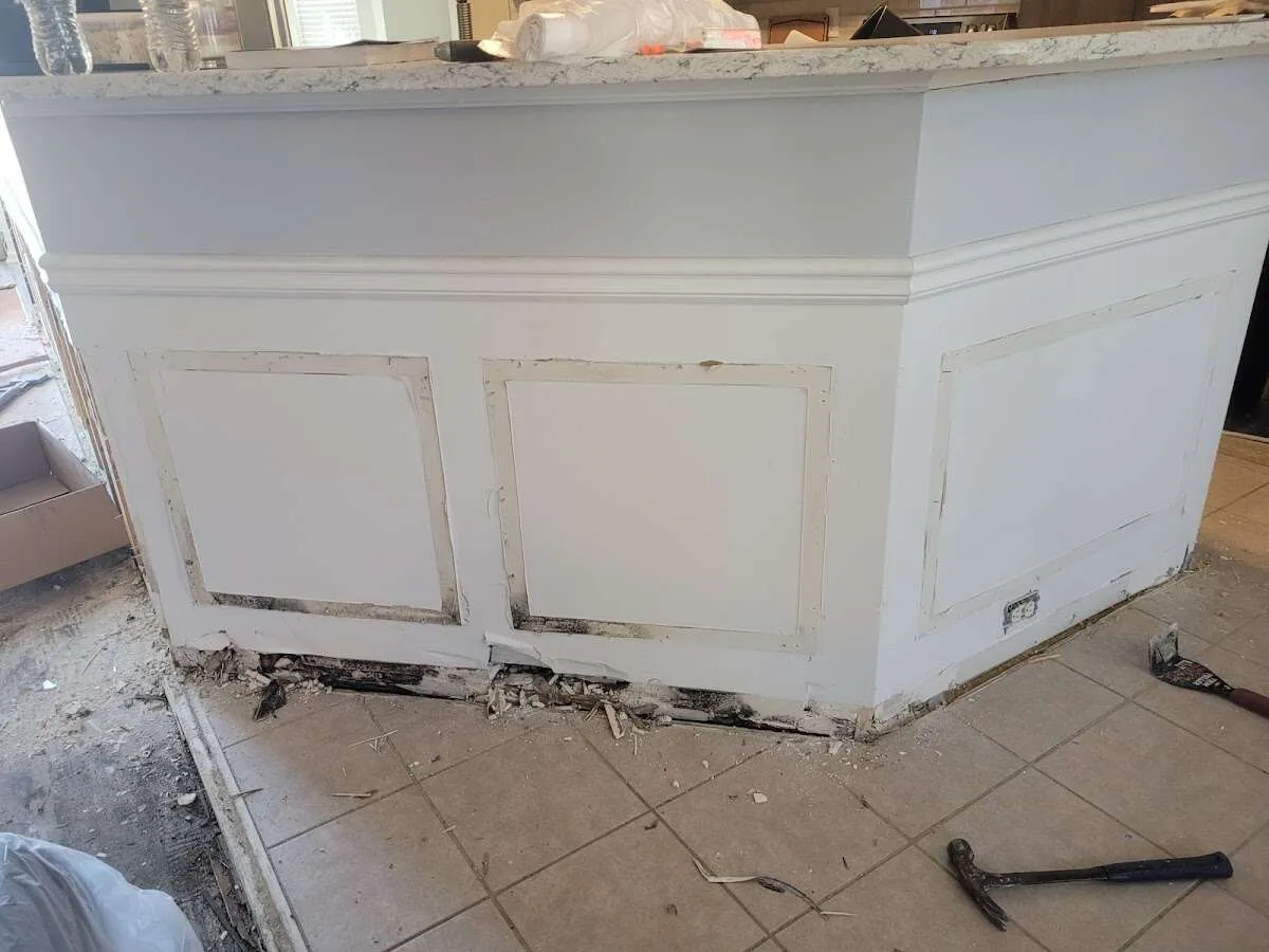 Water damage and mold on kitchen during Sewage Cleanup & Sanitation in Royal Palm Beach